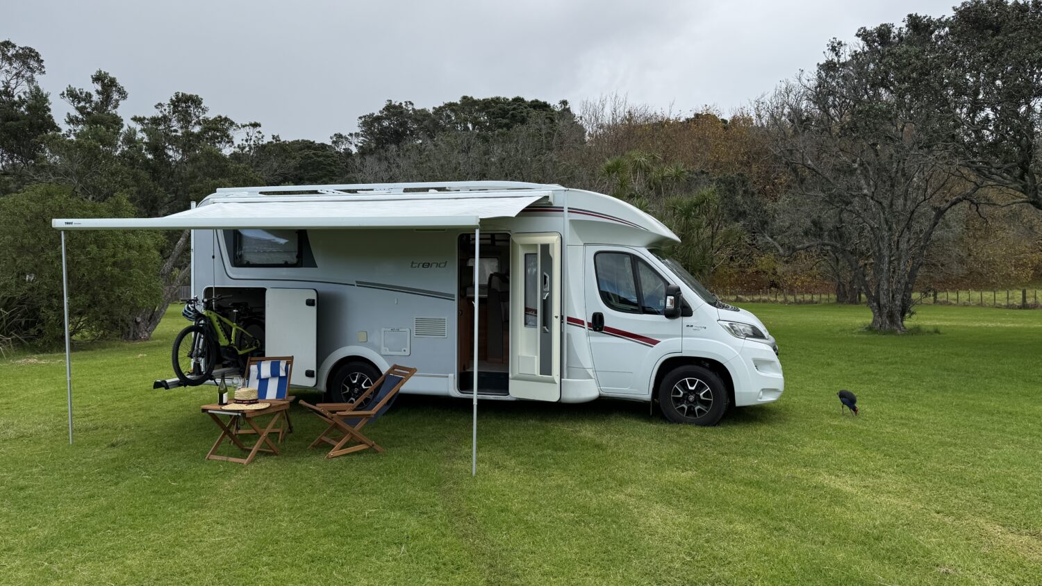 Sammy 4 berth campervan rental in New Zealand with bike rack, awning and twin bed