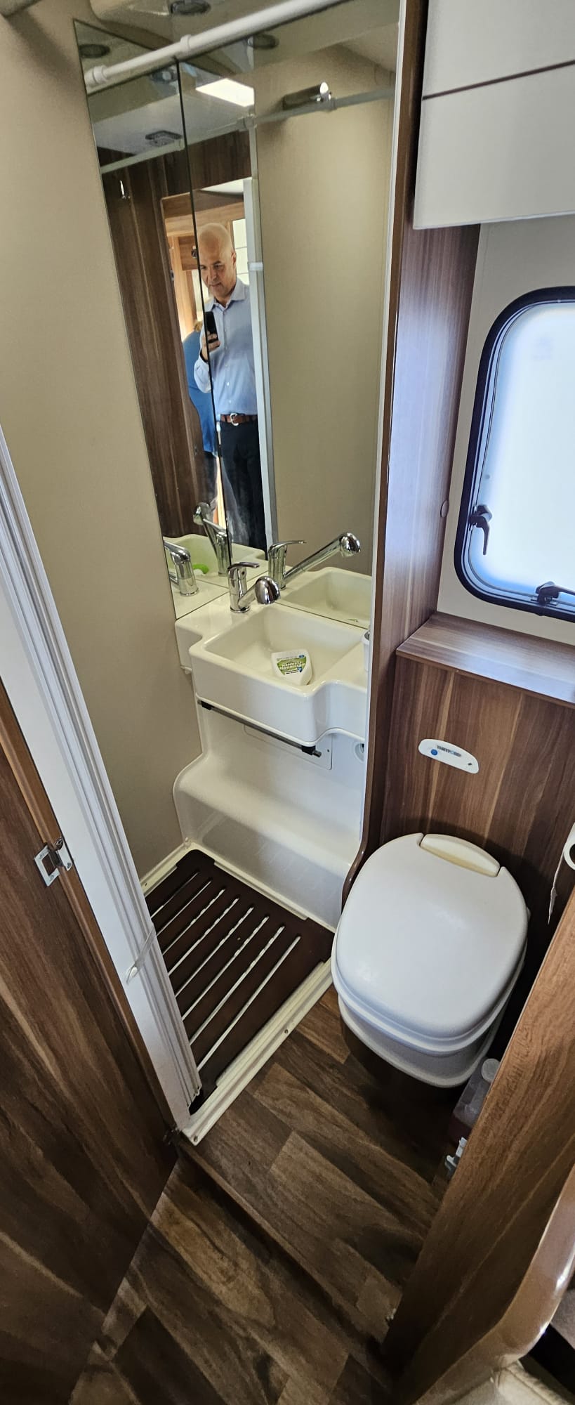 Rosy 6 berth campervan rental in New Zealand with bike rack, awning and spacious family motorhome layout.